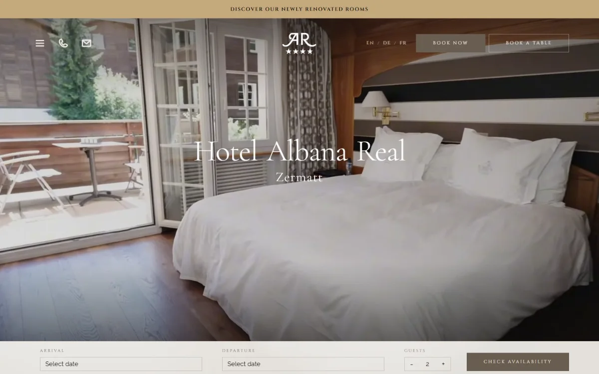 Portada del sitio de Hotel Albana Real en escritorio, con buscador de disponibilidad.